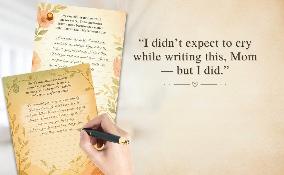 Handwritten letter with floral design and text, held by a hand with a pen, on a soft beige background.